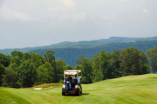 Golfing buggy and mountains